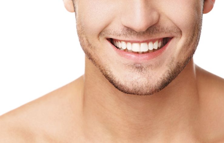 Close-up of man's bright, white smile missing teeth restorative dentistry dentist in Timonium Maryland